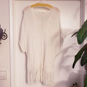White fringed sweater by Graham & Spencer